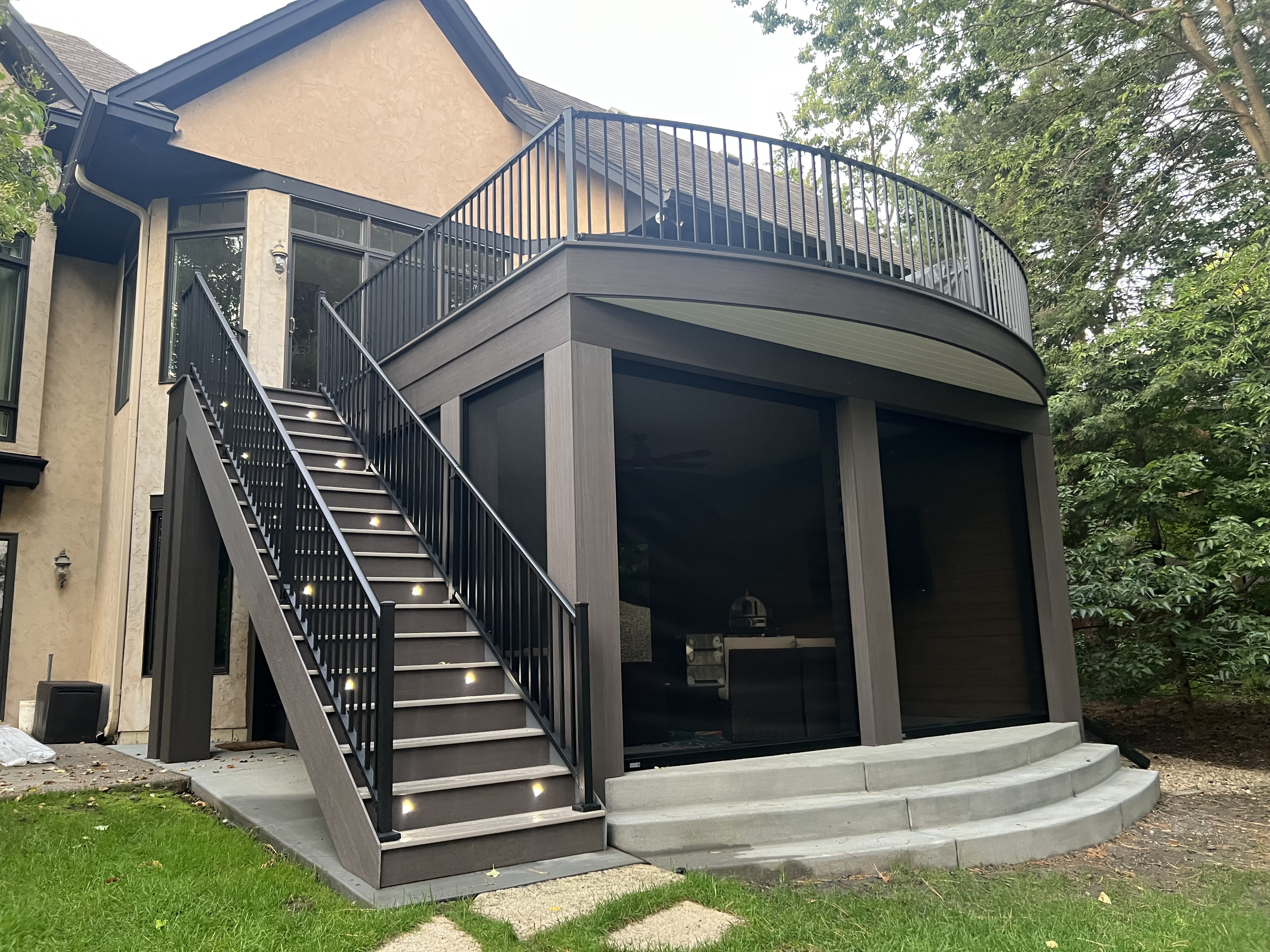 Beautiful Cedar Pool Deck with Metal Railings built by Dream Decks