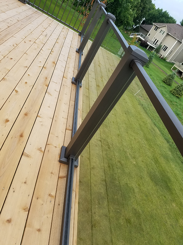 Westbury Glass Railing & TimberTech Decking - Custom deck built by Dream Decks in Twin Cities, Minnesota